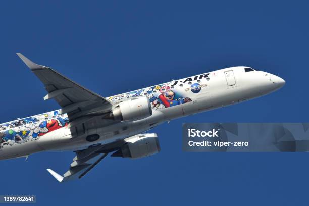 Jair Embraer E190std Passenger Plane Special Livery Universal Studios Japan Scheme Stock Photo - Download Image Now