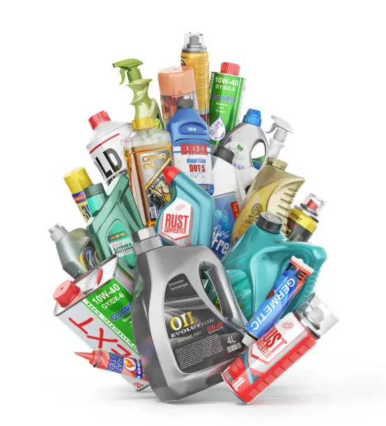 Photo of Different Bottles of car maintenance products on a white background. Oil, detergents and lubricants. 3d illustration