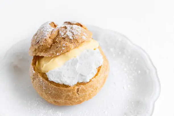Cream puffs, sweets, white background