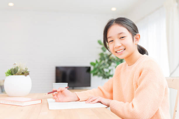 istock asian girl who study 1389795291