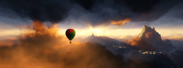 istock Dramatic Mountain Landscape and Hot Air Balloon Flying 1389796768