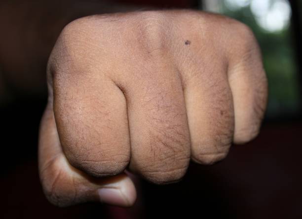 istock punch on the air with blureed background. 1389799001