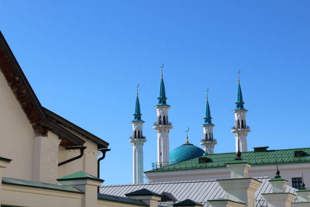 istock The Muslim mosque is visible against the bright blue sky. 1389799760