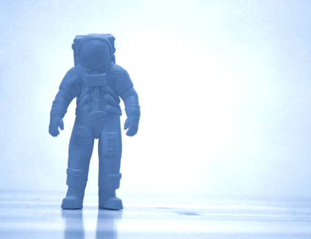 istock Model printed on 3d printer close-up. Cosmonaut of blue color. 1389805809