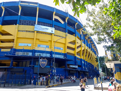 Front view of colorful Boca Juniors soccer stadium. Taken from across the street on a warm sunny morning