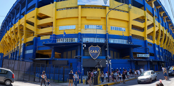 Front view of colorful Boca Juniors soccer stadium. Taken from across the street on a warm sunny morning