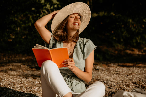 istock Love reading books in the nature 1389811650