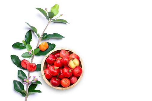 Fresh acerola cherry isolated on white bckground, top view, flat lay