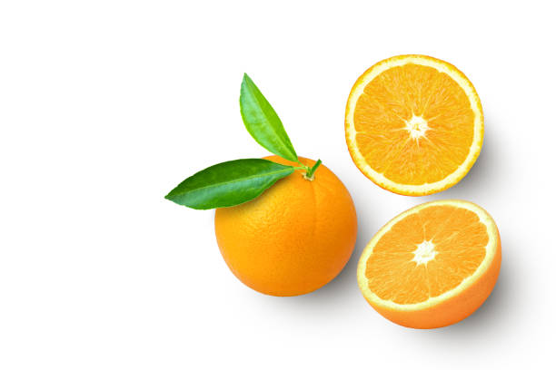 istock Orange fruit with green leaf isolated on white 1389816279