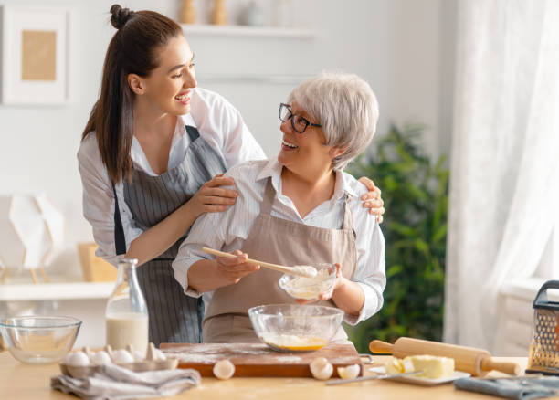 istock family are preparing bakery together 1389819735