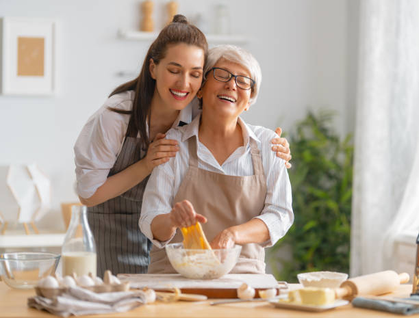 istock family are preparing bakery together 1389819754