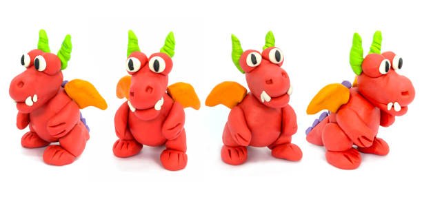 istock Play plasticine Dragon on white background. Handmade clay plasticine 1389820880