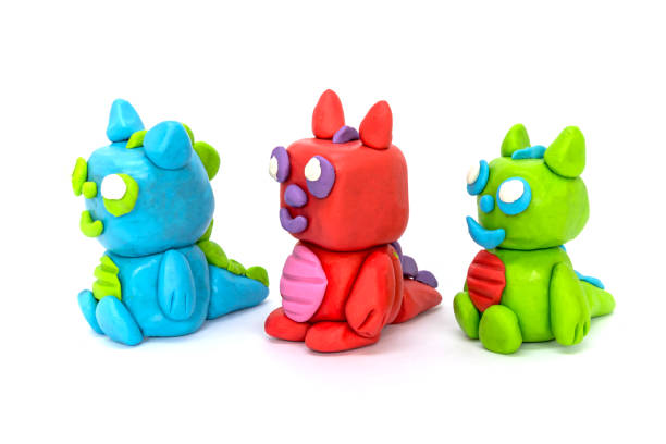 istock Play plasticine Dragon on white background. Handmade clay plasticine 1389820889
