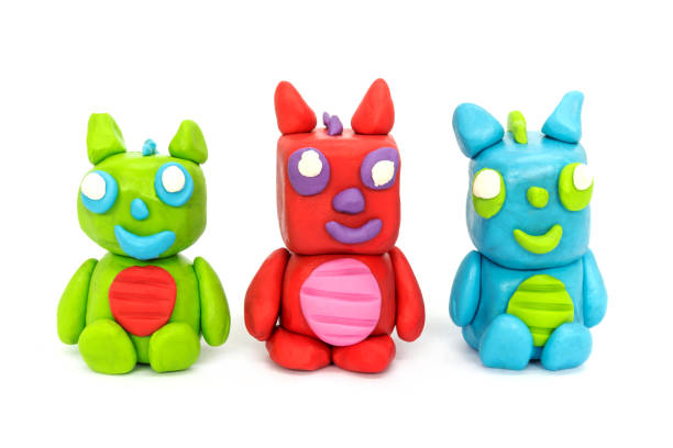 istock Play plasticine Dragon on white background. Handmade clay plasticine 1389820894