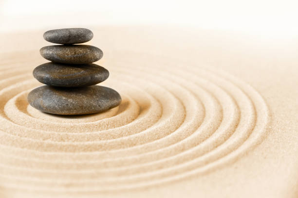 istock Zen japanese garden and black stones background 1389821985