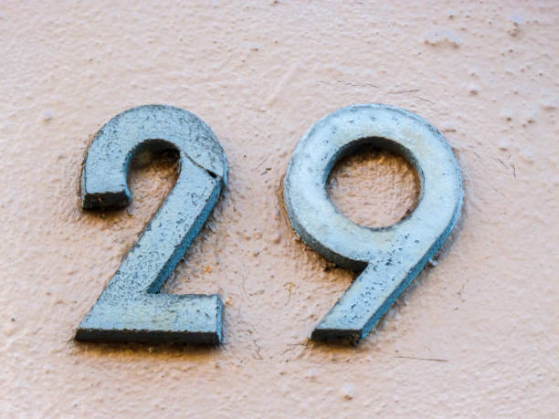 istock Metal home number on a wall 1389824159