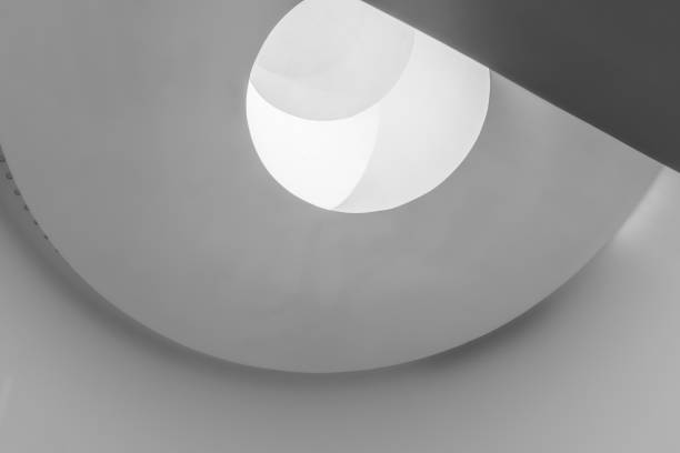 istock Roof, white walls, plaster texture, gray-black background, skylight, black and white, light-colored building, light and shadow 1389824413