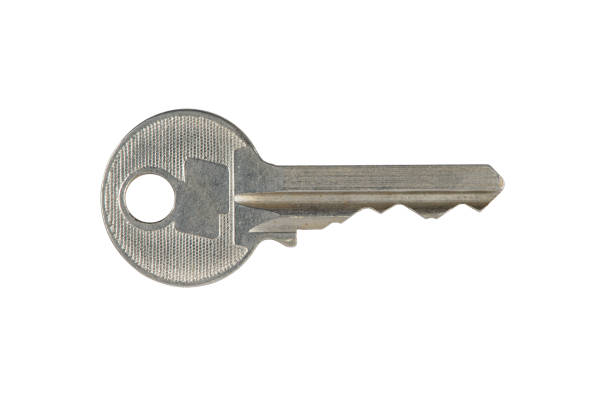 istock Front view of used home key, decorative, isolated, macro shot 1389826633