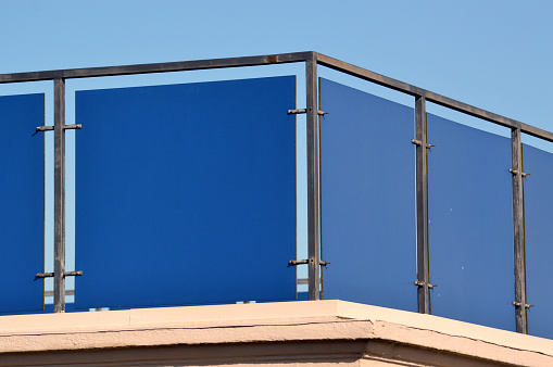 Low angle view of rooftop patio.