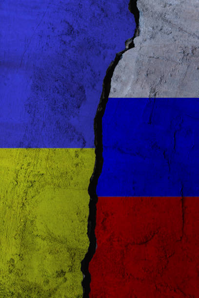 istock The flag of Russia and Ukraine with a deep break between them. 1389827682