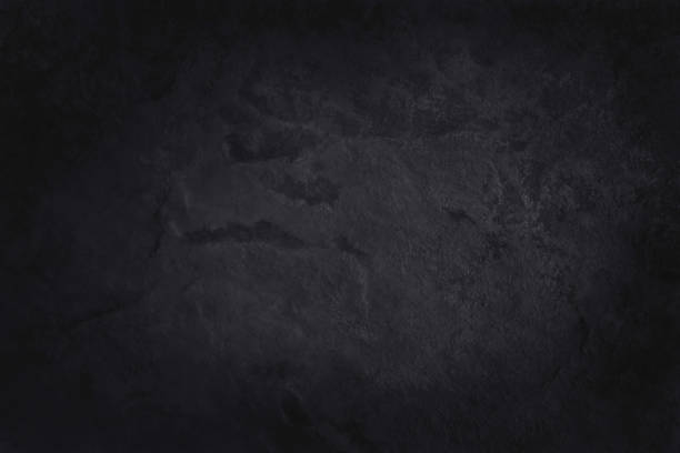 istock Dark grey black slate texture in natural pattern with high resolution for background and design art work. Black stone wall. 1389828095
