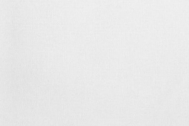 istock White cotton fabric texture background, seamless pattern of natural textile. 1389828100