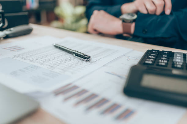 istock A pen on company data, document and report on desk office while accounting working. Accounting business concept. 1389829271
