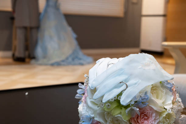 istock I put a wedding ring on the bride and groom's gloves 1389835240