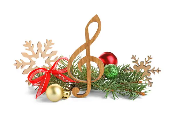 Photo of Wooden music note with fir tree branches and Christmas decor on white background