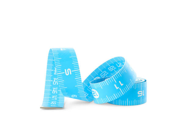istock Light blue measuring tape isolated on white 1389843922