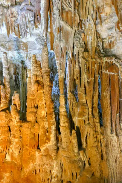 Detail shot inside a flowstone cave in Apulia, Italy