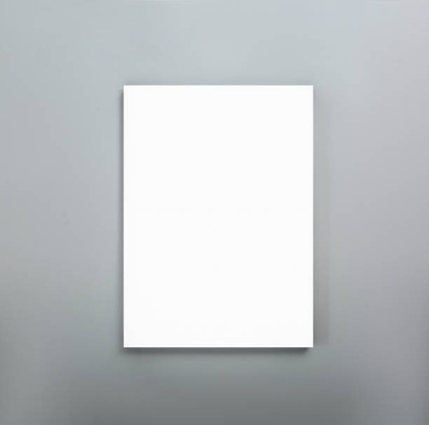 istock Blank poster on grey wall. Mockup for design 1389849774