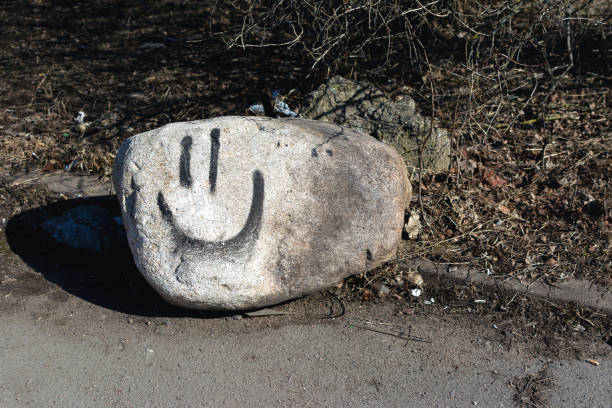 istock A smile painted on a large granite stone 1389851868