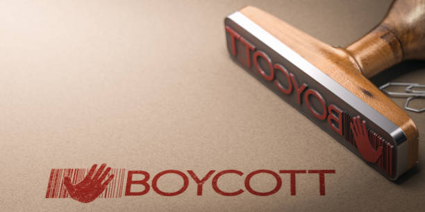 istock Activism concept. Boycott printed on kraft paper with rubbber stamp and copy space. 1389852761
