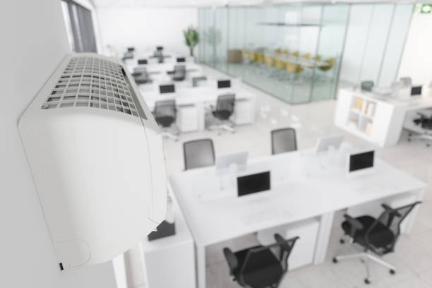 Close-up View Of Air Conditioner In Modern Open Plan Office Close-up View Of Air Conditioner In Modern Open Plan Office cool climate stock pictures, royalty-free photos & images