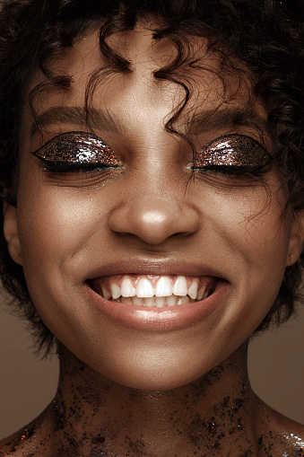 Portrait of a girl with emotion on her face. Joy. Photo taken in studio