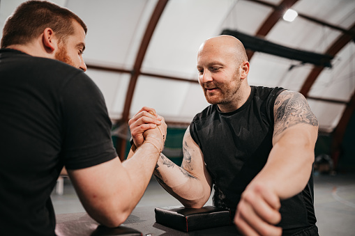 men arm wrestling