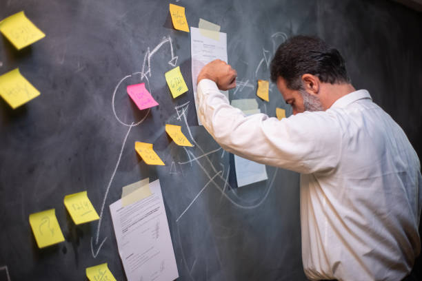 istock Focused businessman thinking over new project 1389856753
