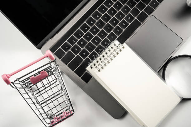 istock Headphones, laptops and shopping carts 1389858694