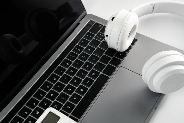 istock Computers, headphones and calculators on a white background 1389859652