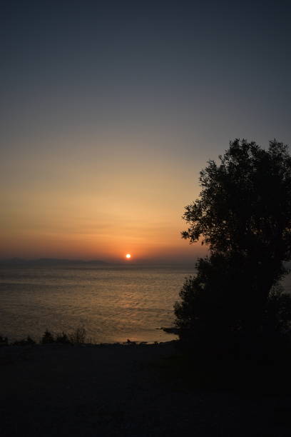 istock Sunset over the sea 1389862080