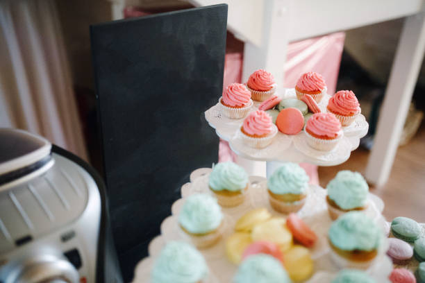 istock Beautiful delicious cakes on decorated wedding table 1389862315