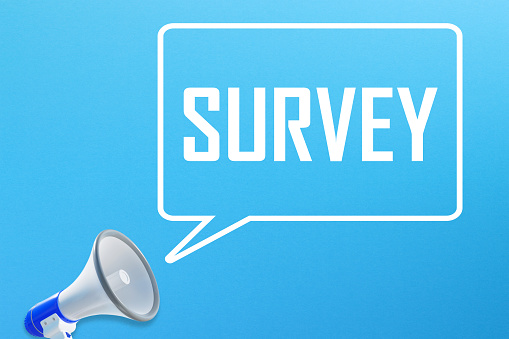 Survey message in speech bubble and megaphone on blue background