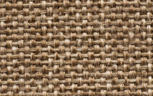 Close up of background with beige rough texture. Macro background