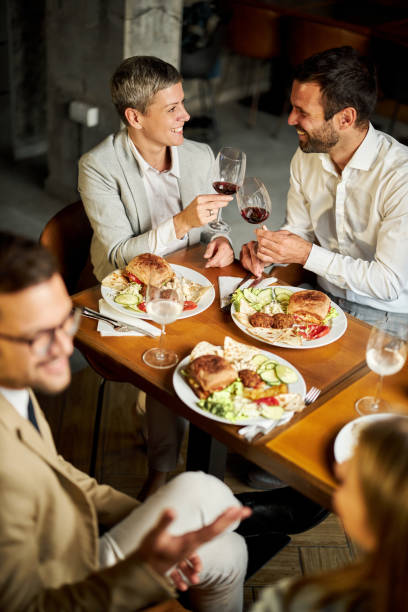 istock Celebratory toast on business lunch! 1389865313