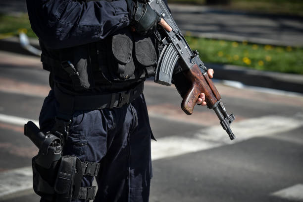 istock A special forces soldier holding his automatic rifle during an incident 1389869429