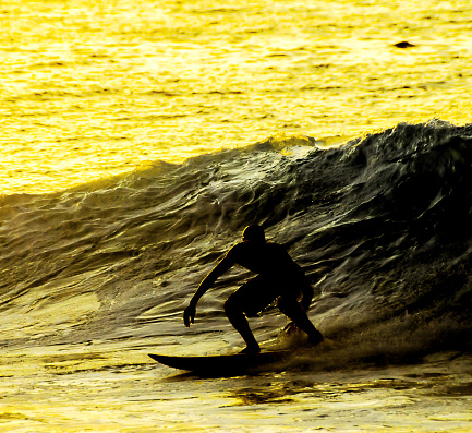 Silhouette Surfer at Sunset in Tenerife Canary Island Spain