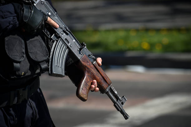 istock A special forces soldier holding his automatic rifle during an incident 1389869680