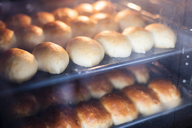 istock Pies in oven. View through the glass. Closeup, selective focus. 1389870075