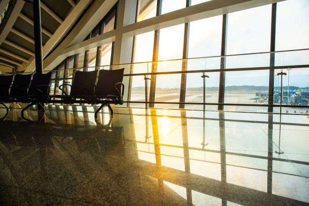 istock Airport window at sunset 1389870954